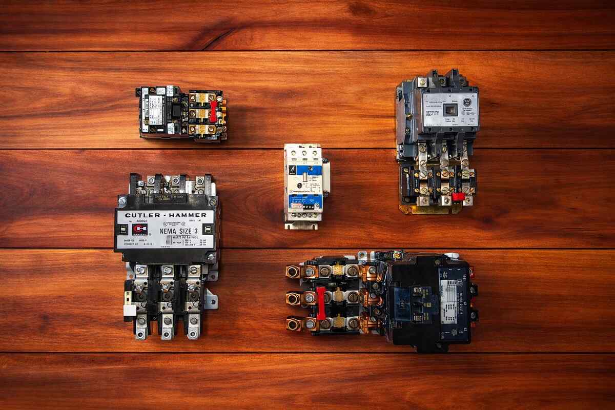 Industrial motor starter including contactor and overload relay commonly inspected during motor starter troubleshooting to prevent motor starter overload trips